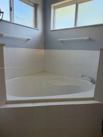 a bathroom with bathtub
