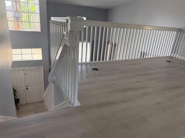 a view of entryway with wooden floor
