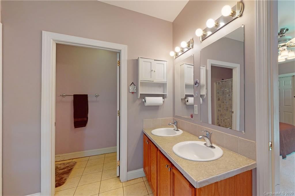 3275 Craig Farm Road Lancaster, SC 29720 - Photo 22 of 42 a bathroom with a sink and a mirror