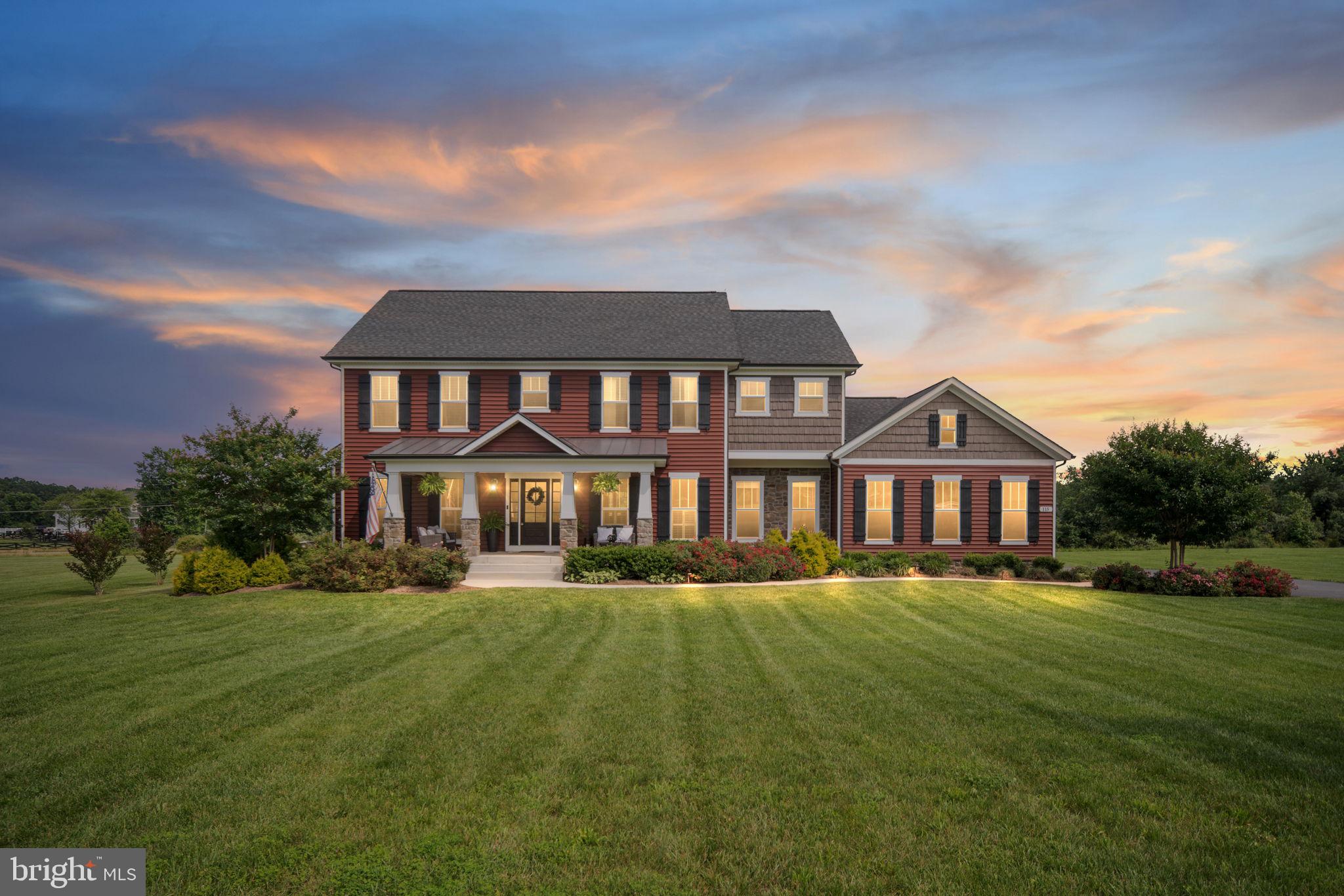 115 Saddle Ridge Lane Fredericksburg, VA 22406 - Photo 1 of 100 a front view of a house with a garden