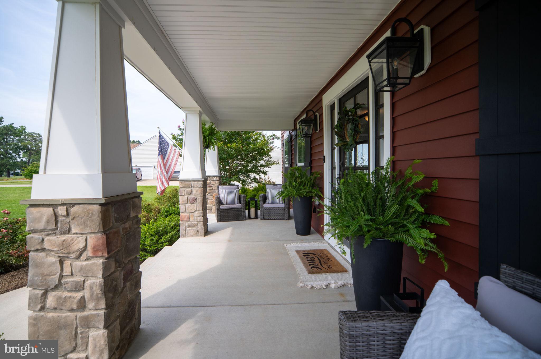 115 Saddle Ridge Lane Fredericksburg, VA 22406 - Photo 11 of 100 a potted plant sitting in front of a house