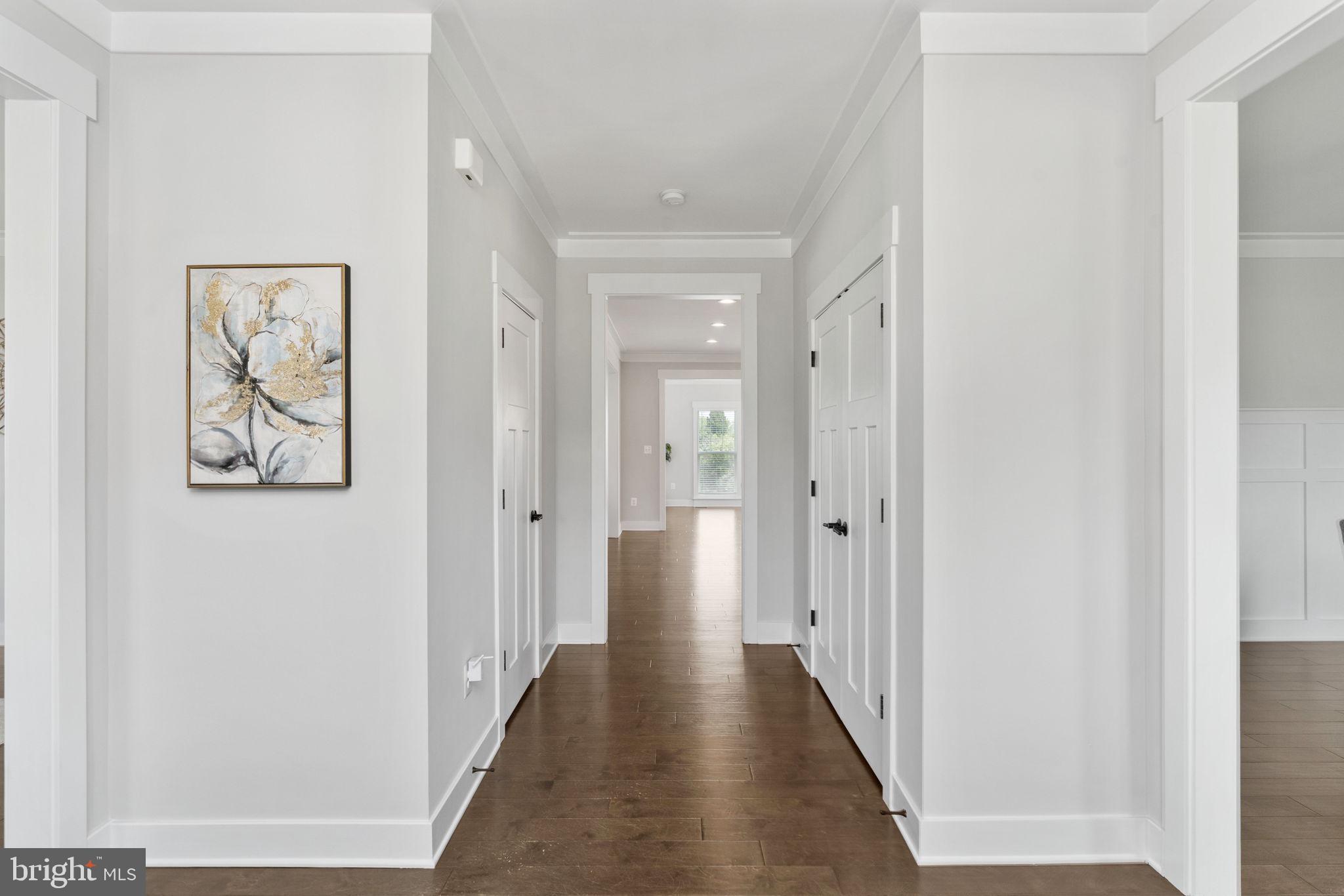 115 Saddle Ridge Lane Fredericksburg, VA 22406 - Photo 13 of 100 a view of a hallway with wooden floor