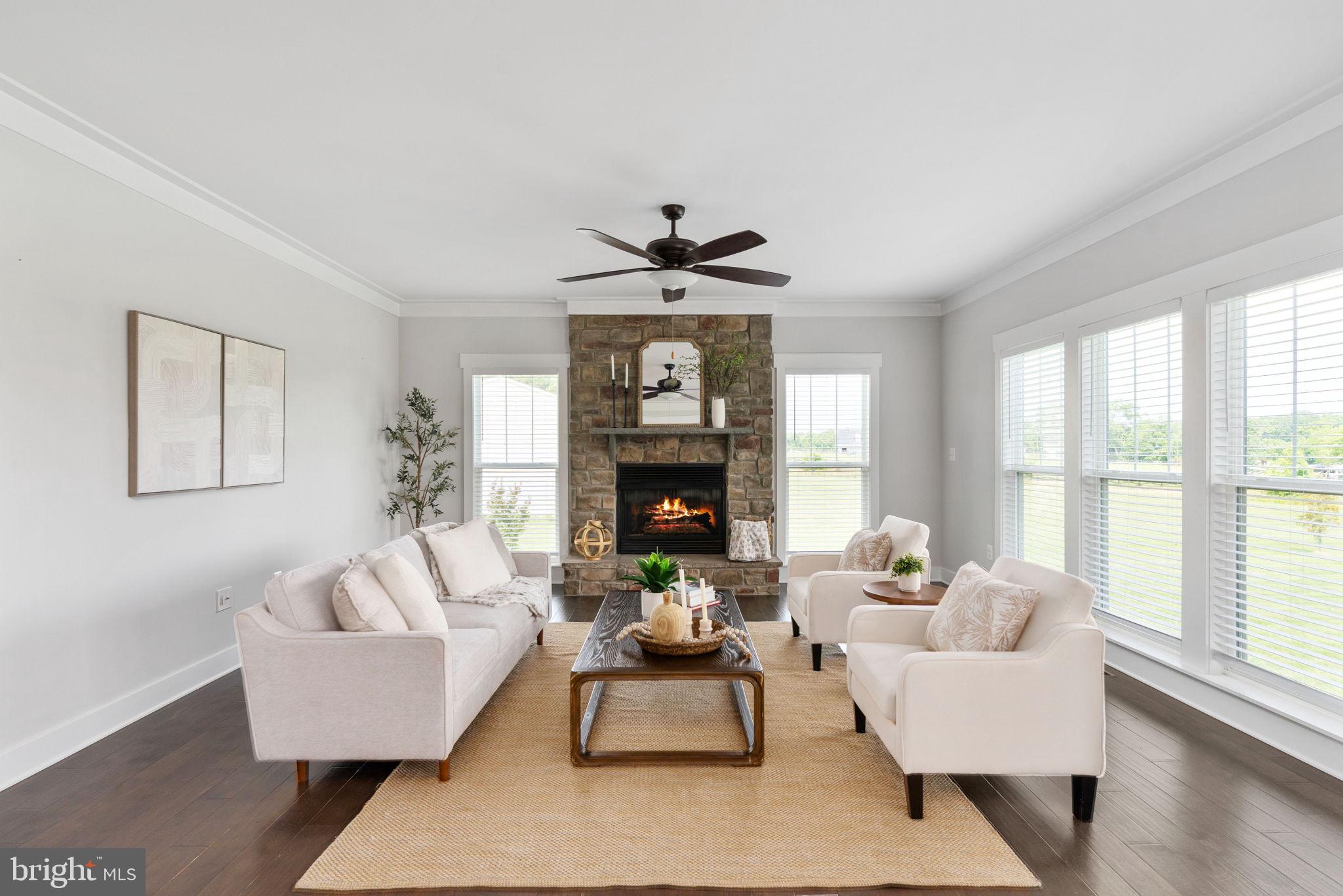 115 Saddle Ridge Lane Fredericksburg, VA 22406 - Photo 22 of 100 a living room with furniture and a fireplace
