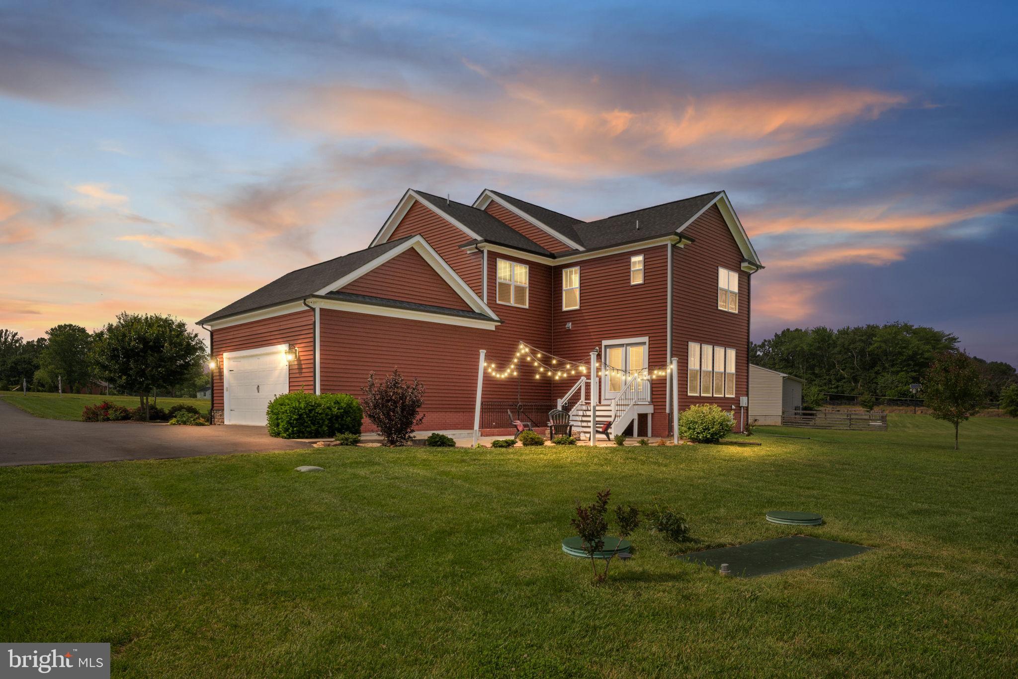 115 Saddle Ridge Lane Fredericksburg, VA 22406 - Photo 3 of 100 a front view of a house with a yard and trees