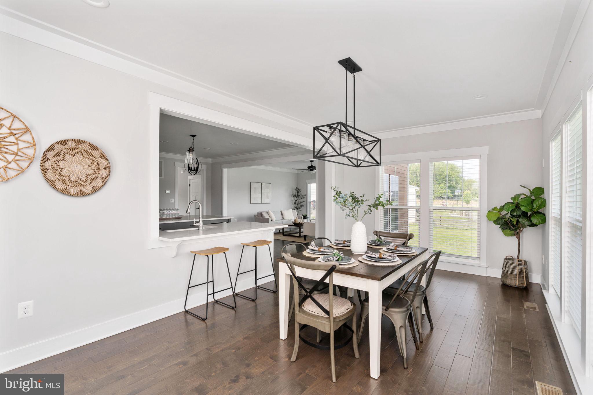 115 Saddle Ridge Lane Fredericksburg, VA 22406 - Photo 37 of 100 a view of a dining room with furniture window and wooden floor