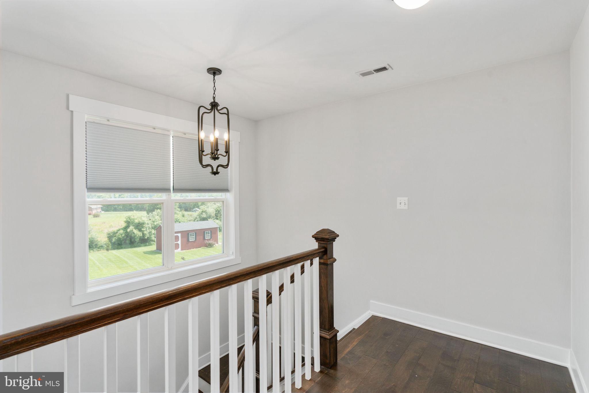 115 Saddle Ridge Lane Fredericksburg, VA 22406 - Photo 48 of 100 a view of hallway with wooden floor