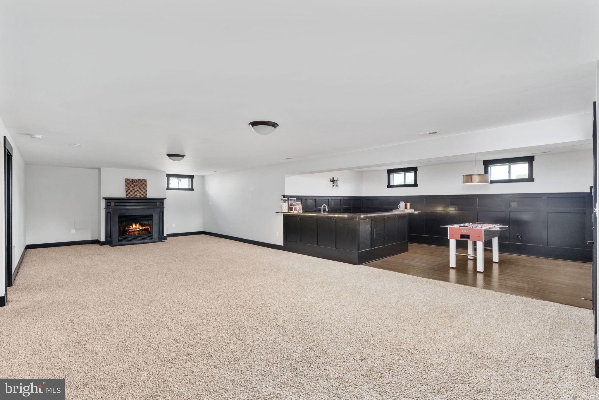 115 Saddle Ridge Lane Fredericksburg, VA 22406 - Photo 74 of 100 a living room with furniture and a kitchen view