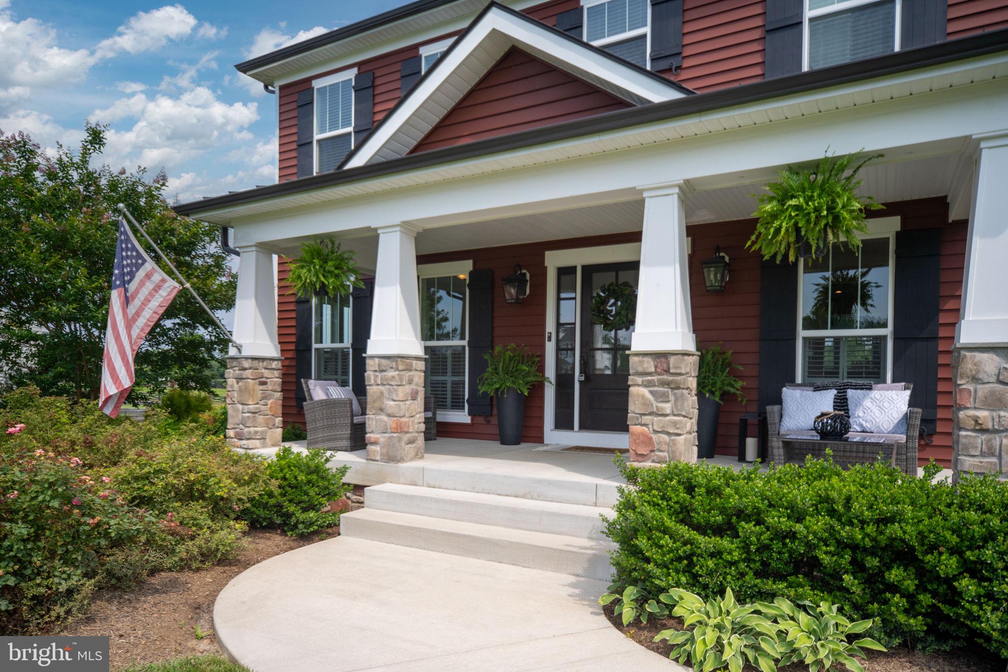 115 Saddle Ridge Lane Fredericksburg, VA 22406 - Photo 10 of 100 front view of a house with a porch