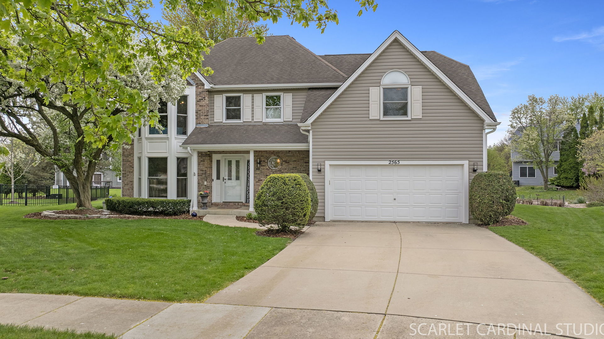 2565 Thornley Court Aurora, IL 60504 - Photo 2 of 59 a front view of a house with a yard