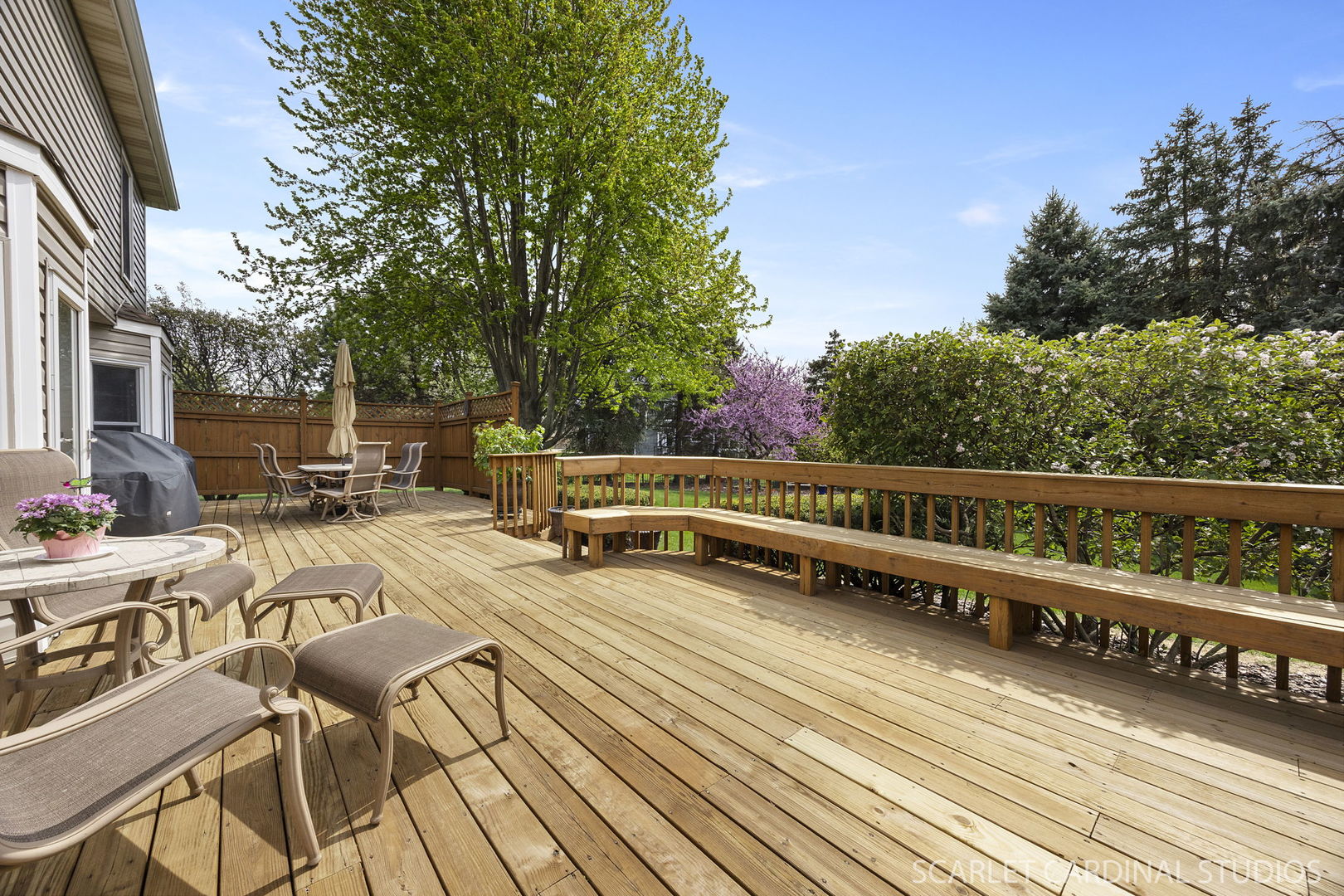 2565 Thornley Court Aurora, IL 60504 - Photo 27 of 59 a view of balcony with wooden floor and outdoor seating