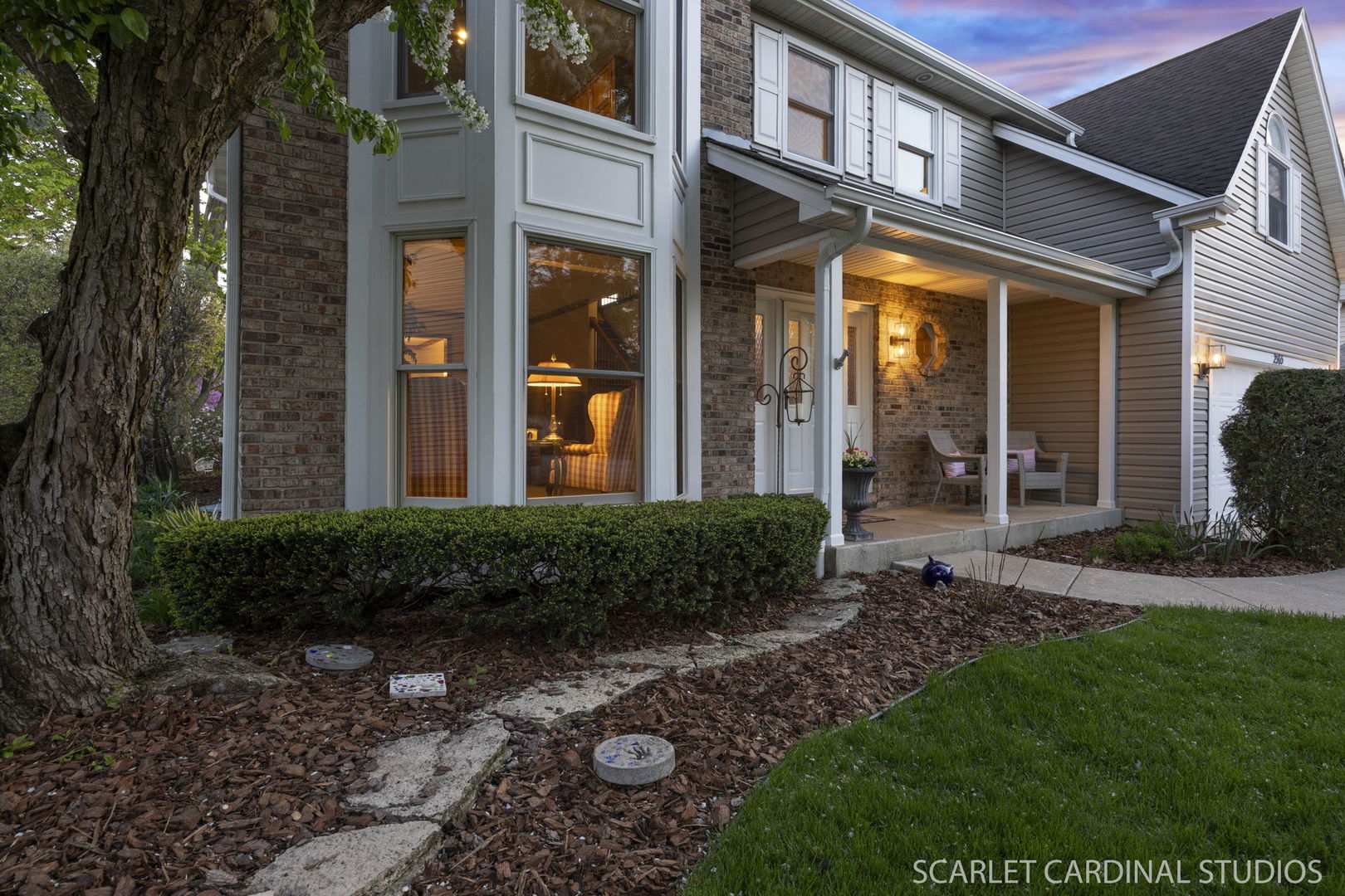 2565 Thornley Court Aurora, IL 60504 - Photo 36 of 59 a view of a brick building next to a yard