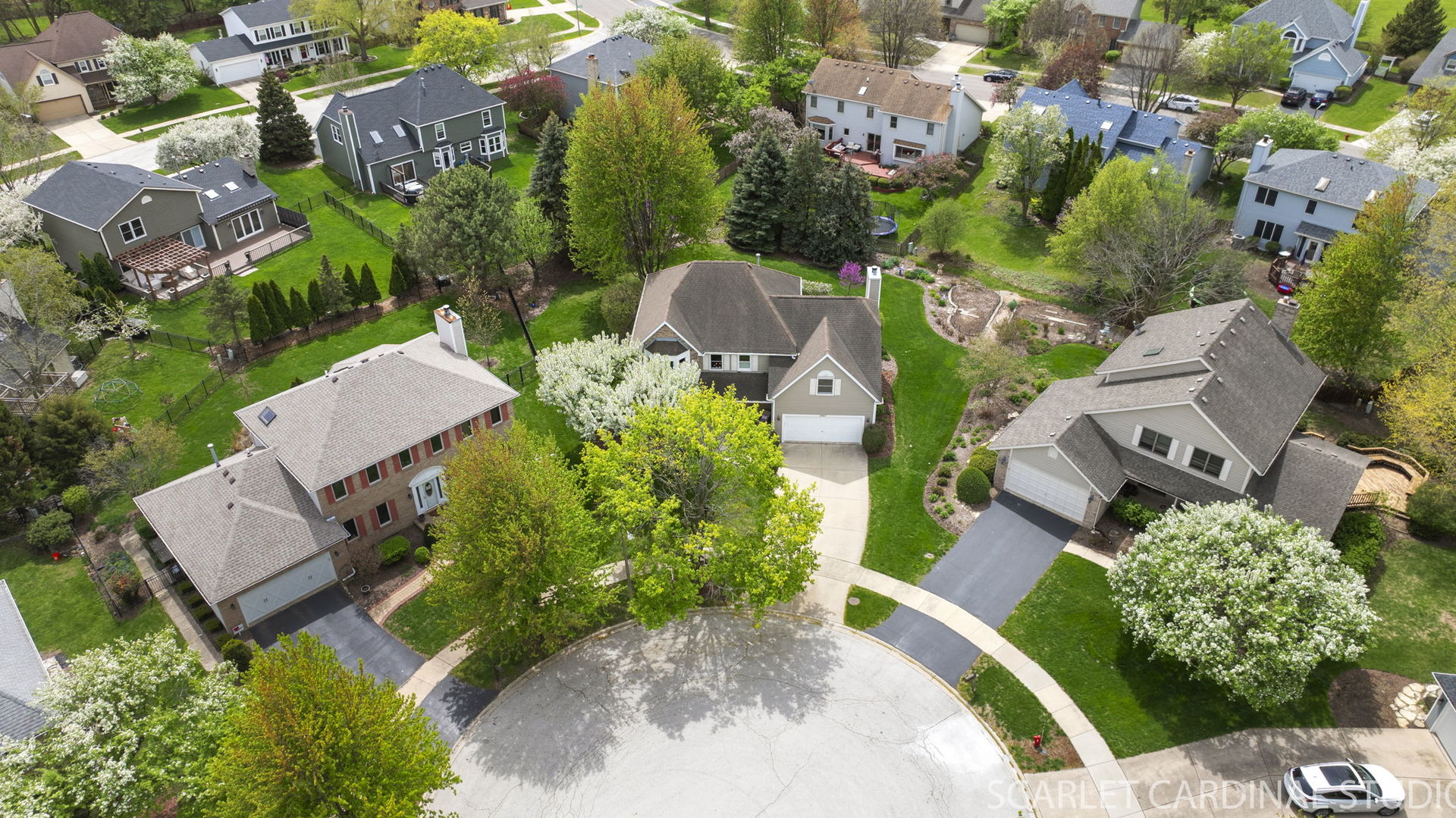 2565 Thornley Court Aurora, IL 60504 - Photo 47 of 59 an aerial view of a house with a yard and lake view in back