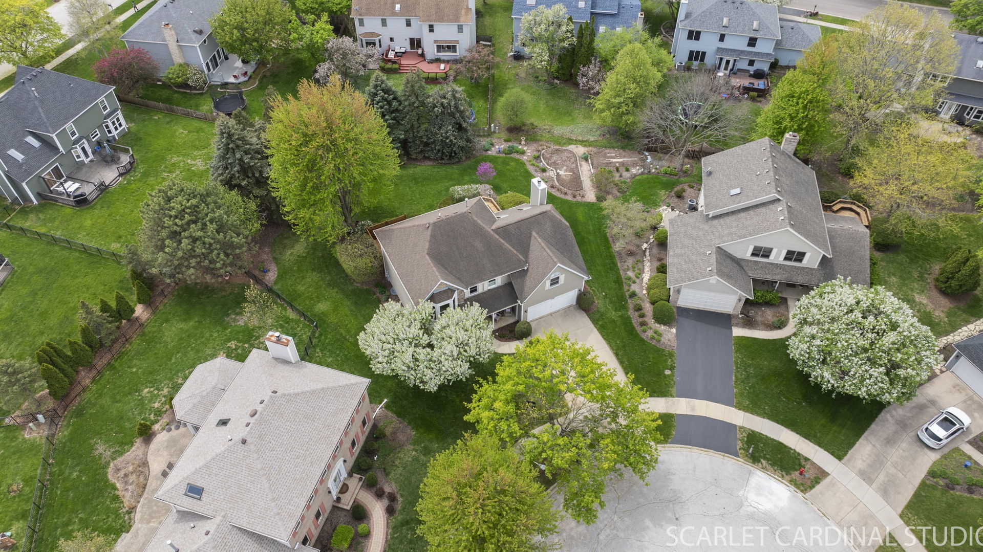 2565 Thornley Court Aurora, IL 60504 - Photo 52 of 59 an aerial view of a house with a yard and garden
