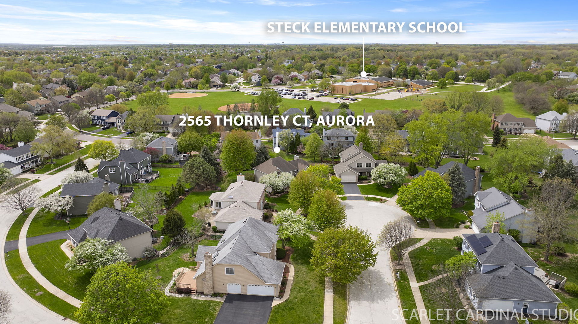 2565 Thornley Court Aurora, IL 60504 - Photo 53 of 59 an aerial view of residential building with parking space