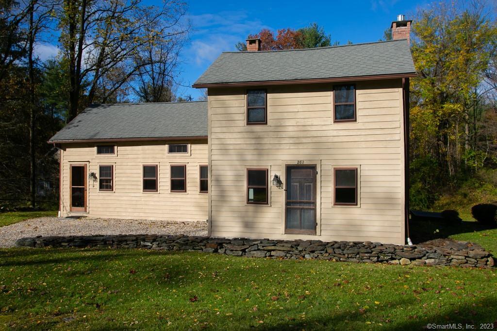 282 Taconic Road Salisbury, CT 06068 - Photo 1 of 1 a front view of a house with a yard