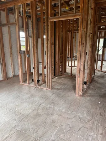 a view of a room with large windows