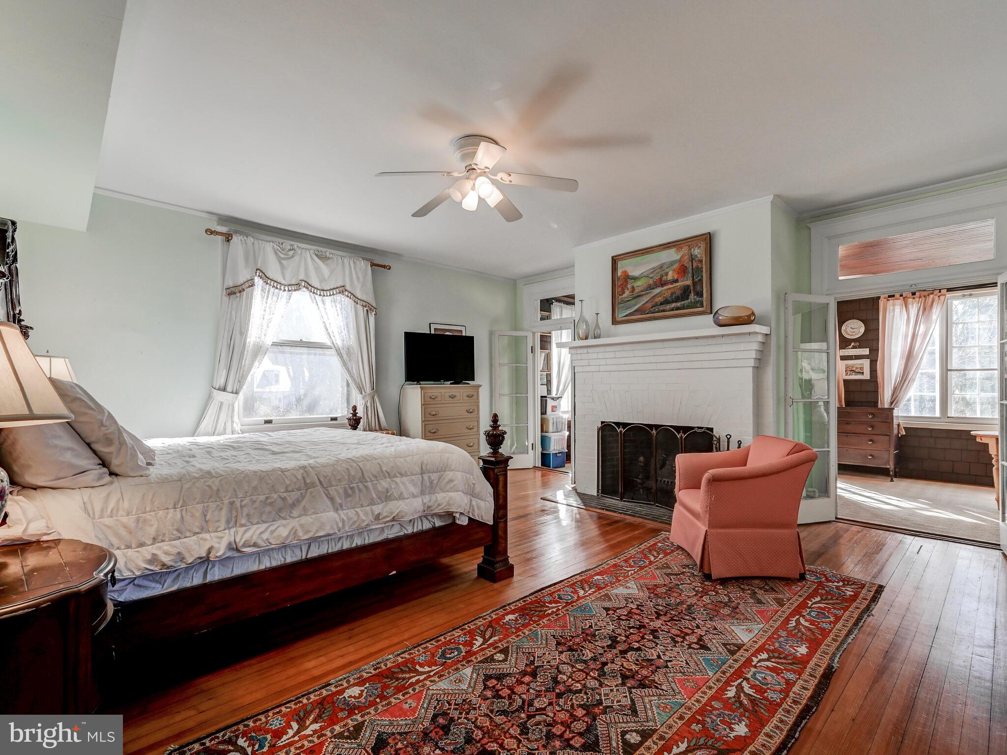 202 Edgevale Road Baltimore, MD 21210 - Photo 23 of 40 Primary bedroom with fireplace