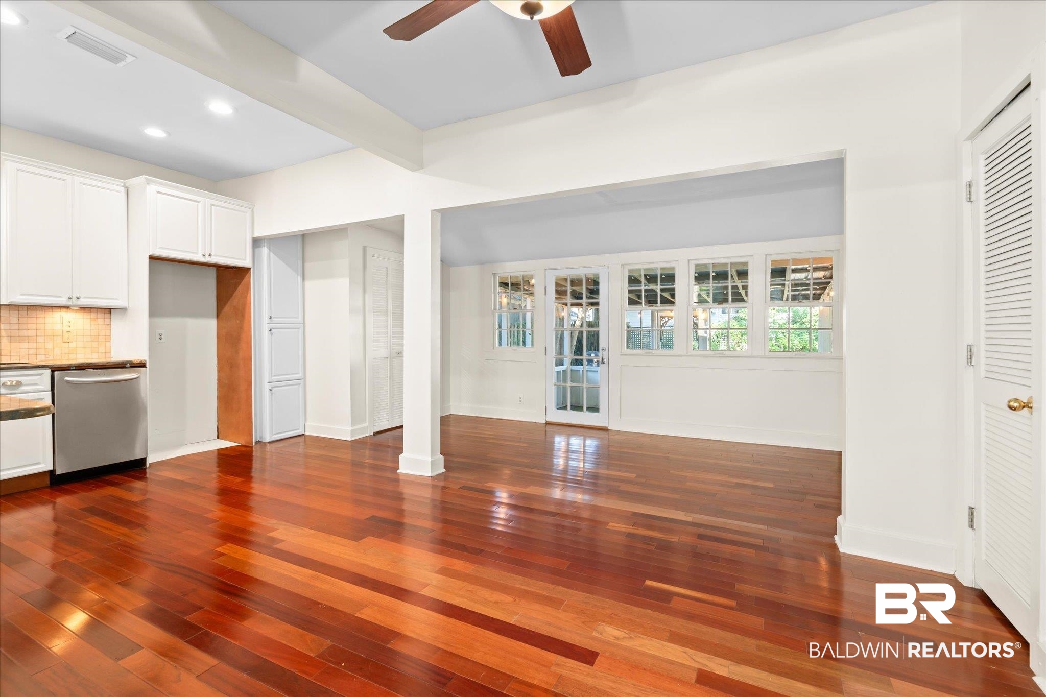 1220 Elmira Street Mobile, AL 36604 - Photo 6 of 20 Unfurnished living room featuring ceiling fan and dark wood-type flooring