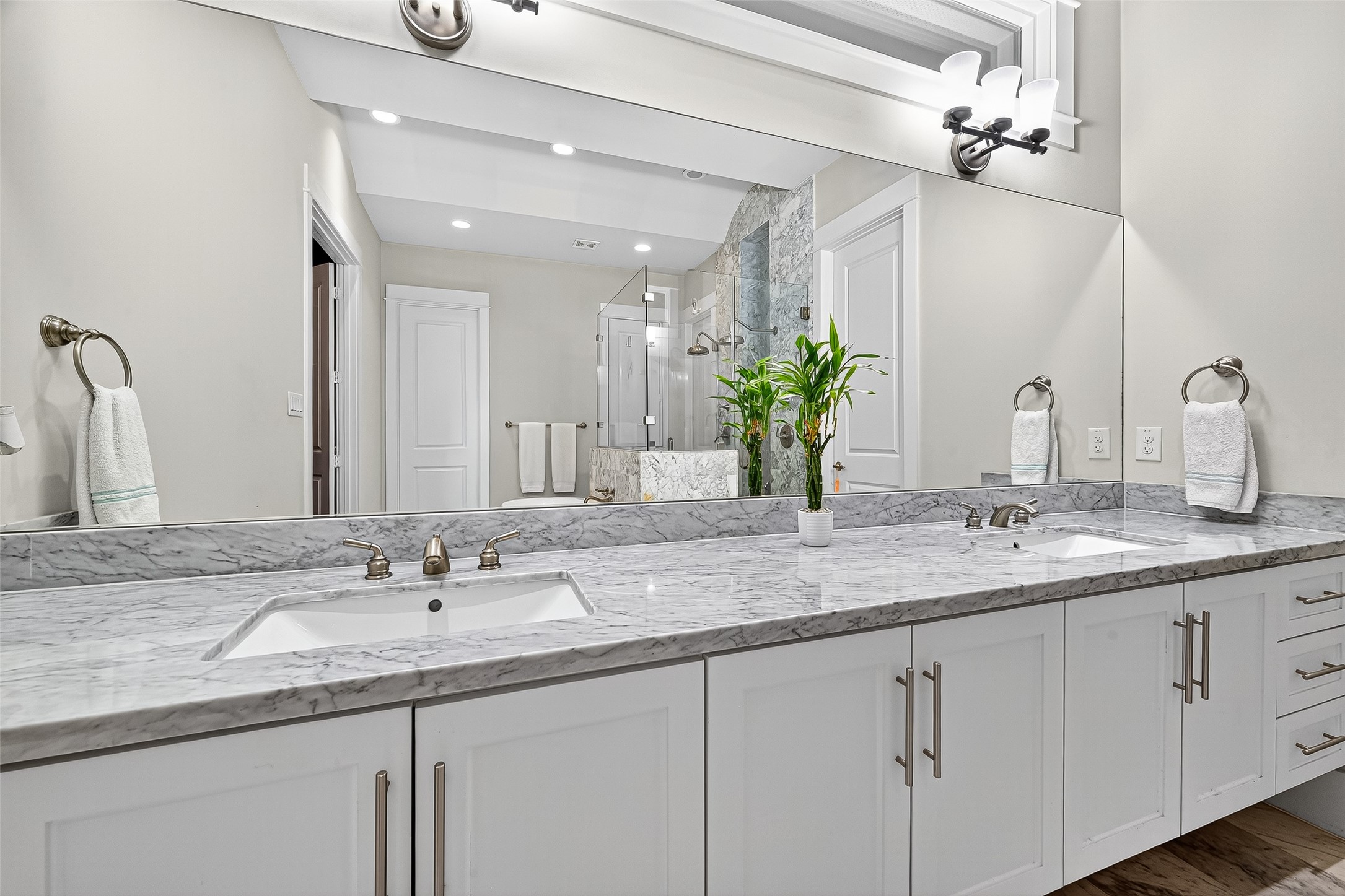 2217 West Main Street Houston, TX 77098 - Photo 15 of 31 a bathroom with double sink and a mirror