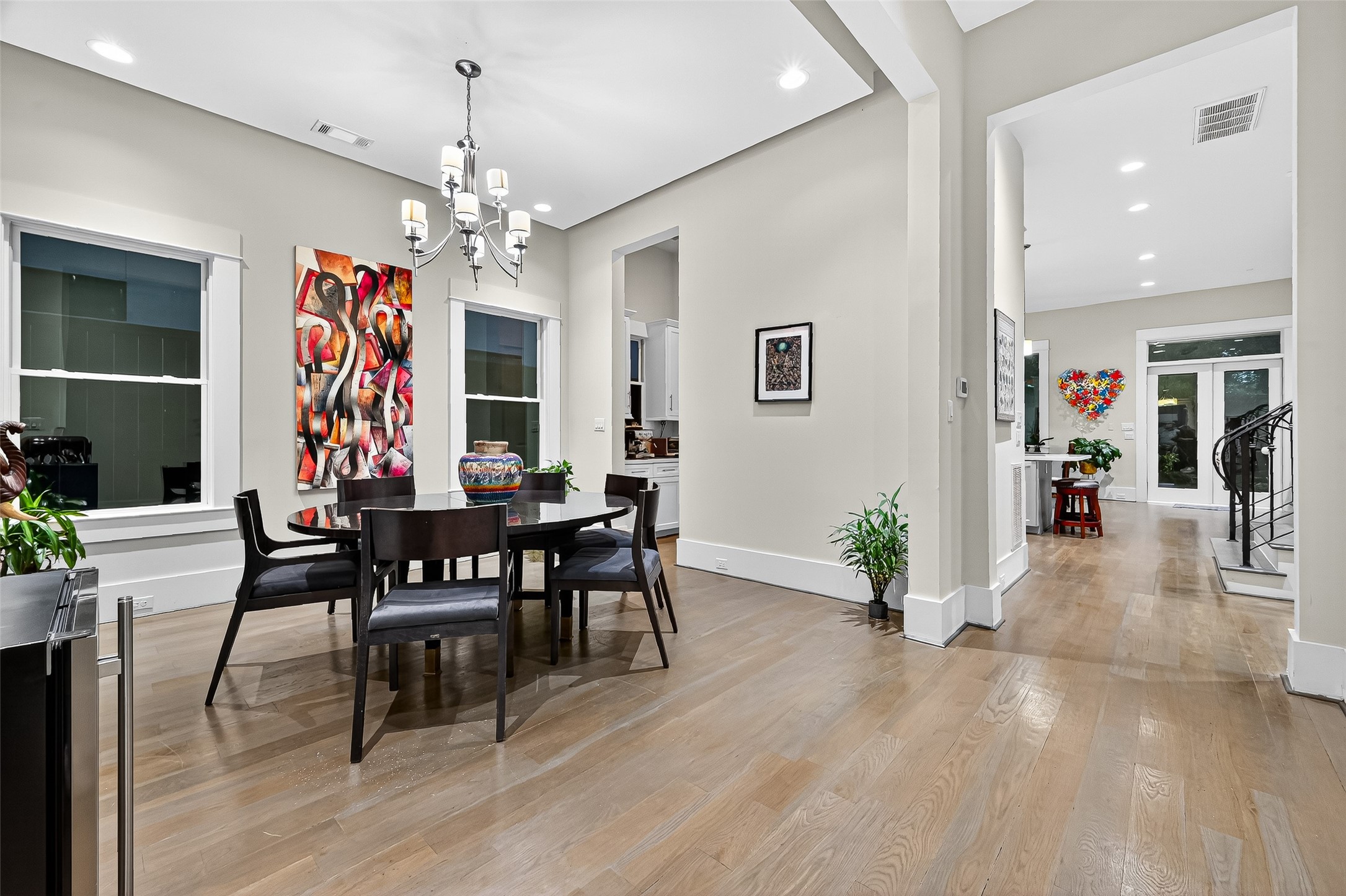 2217 West Main Street Houston, TX 77098 - Photo 9 of 31 a view of a dining room with furniture window and wooden floor