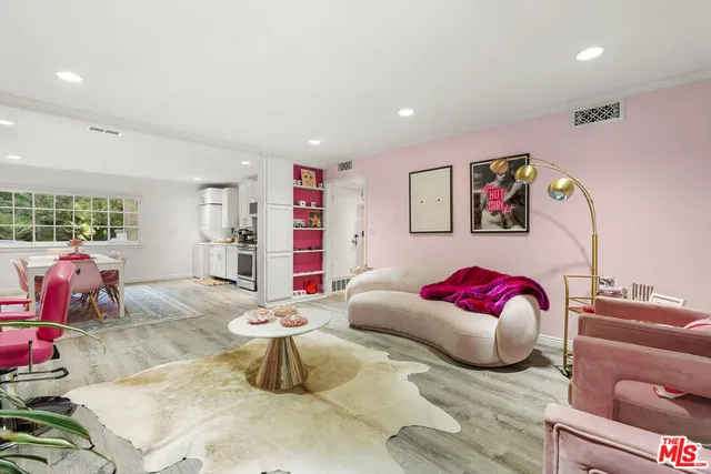 a bedroom with furniture and a couch