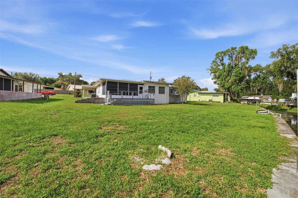 1830 South Mandarin Terrace Inverness, FL 34450 - Photo 22 of 47 a view of a house with a big yard