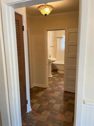 a view of a refrigerator with wooden door