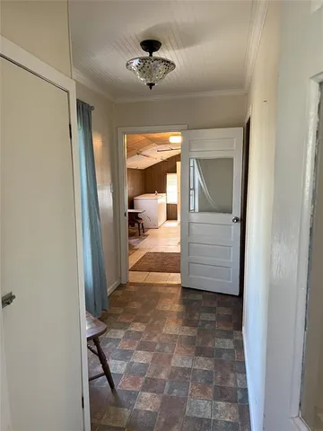a view of a roof deck with wooden floor and fence