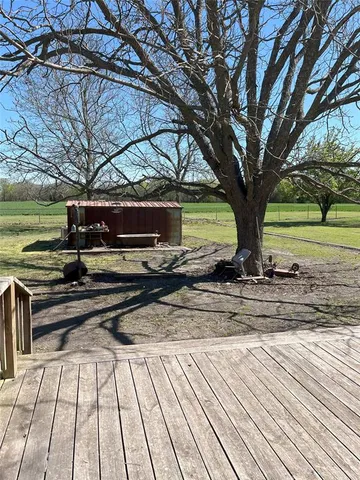 a view of a house with a big yard