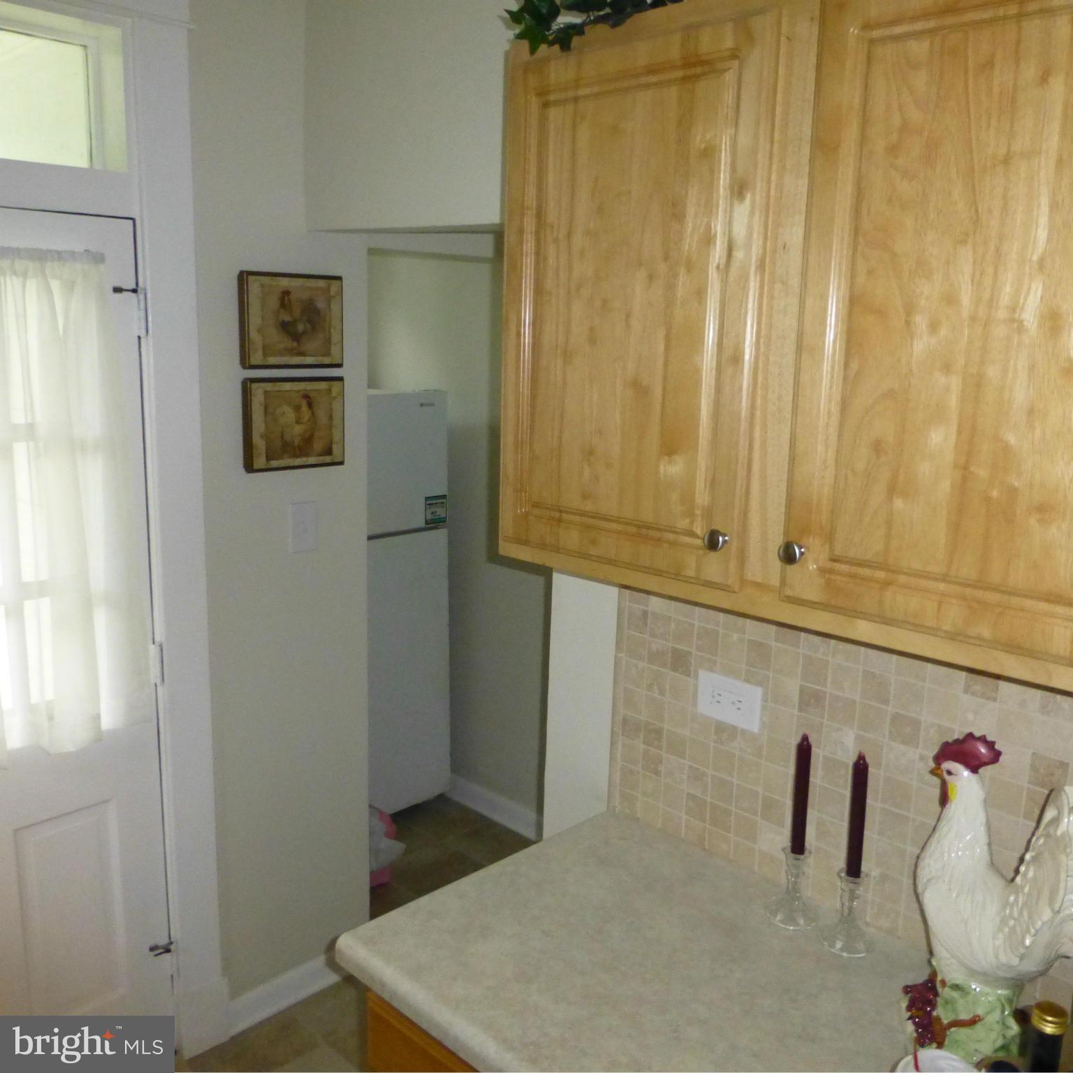 709 Murdock Road Baltimore, MD 21212 - Photo 7 of 17 Kitchen with refrigerator alcove
