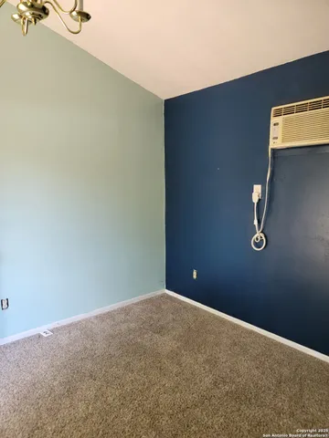 a view of a room with a window