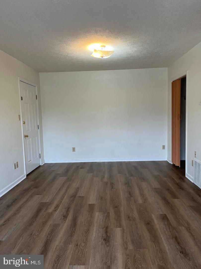 2264 Papermill Road, Unit E Winchester, VA 22601 - Photo 5 of 8 a view of an empty room and window