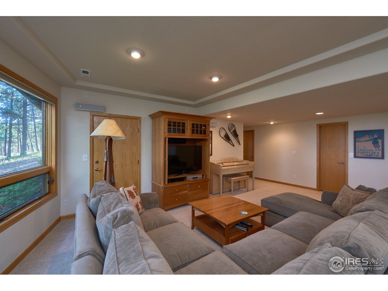 321 Peakview Road Boulder, CO 80302 - Photo 28 of 40 a living room with furniture and a flat screen tv