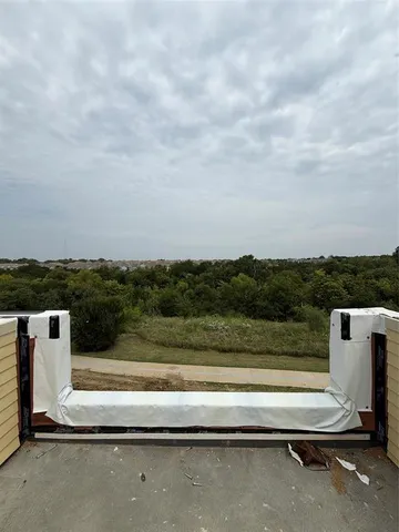 a view of outdoor space with seating area
