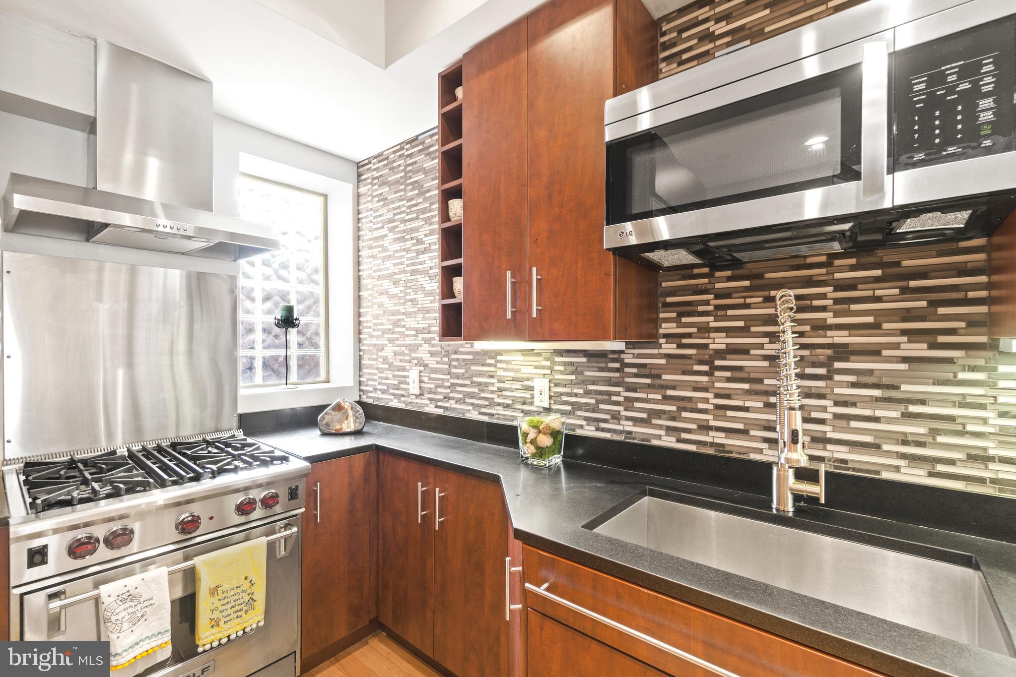 1806 Kalorama Road Northwest, Unit 4 Washington, DC 20009 - Photo 6 of 28 Wolf range & stainless appliances