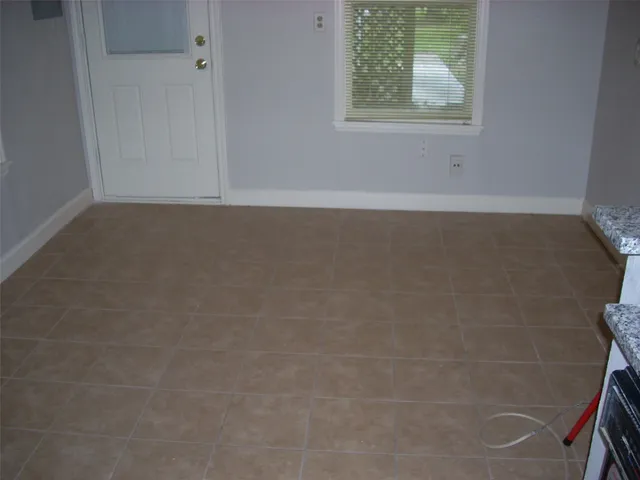 an empty room with a window