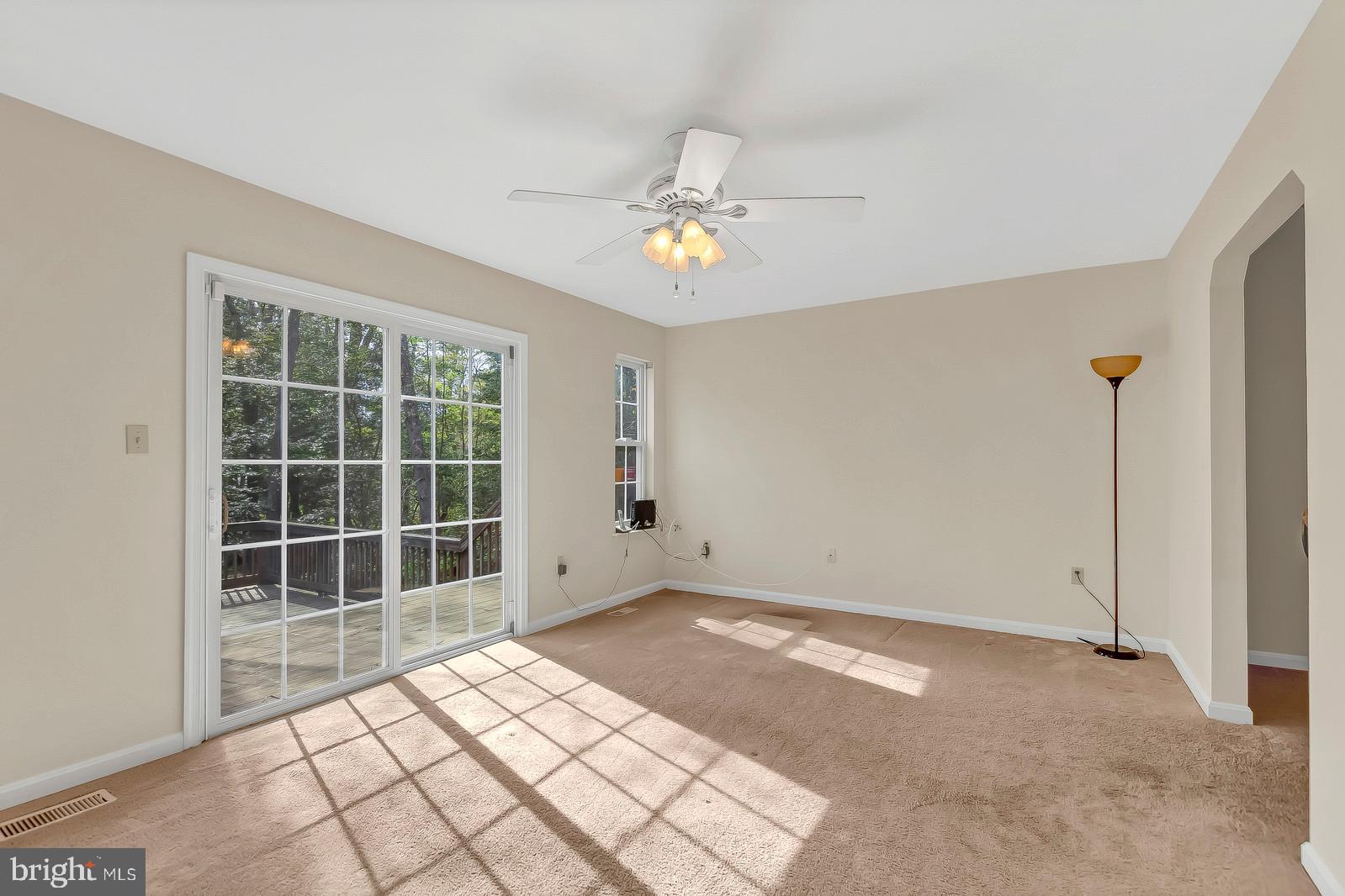 6815 Mackall Road St. Leonard, MD 20685 - Photo 7 of 38 a view of empty room with a window