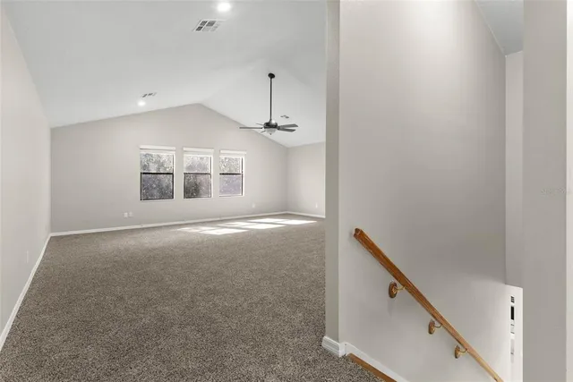 a view of empty room with windows