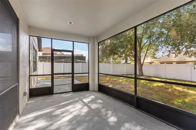 a view of an large window with an outdoor space