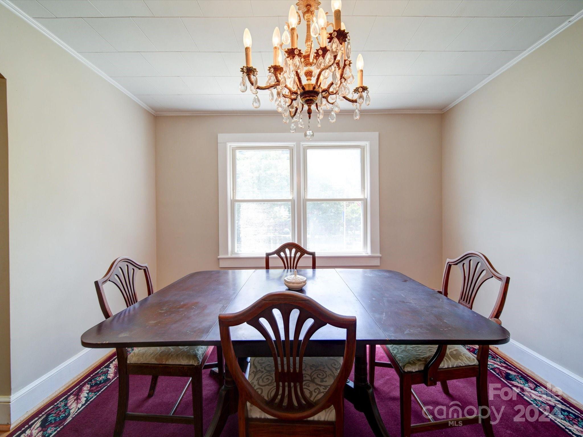1102 White Store Road Wadesboro, NC 28170 - Photo 15 of 35 a view of a dining room with furniture window and outside view