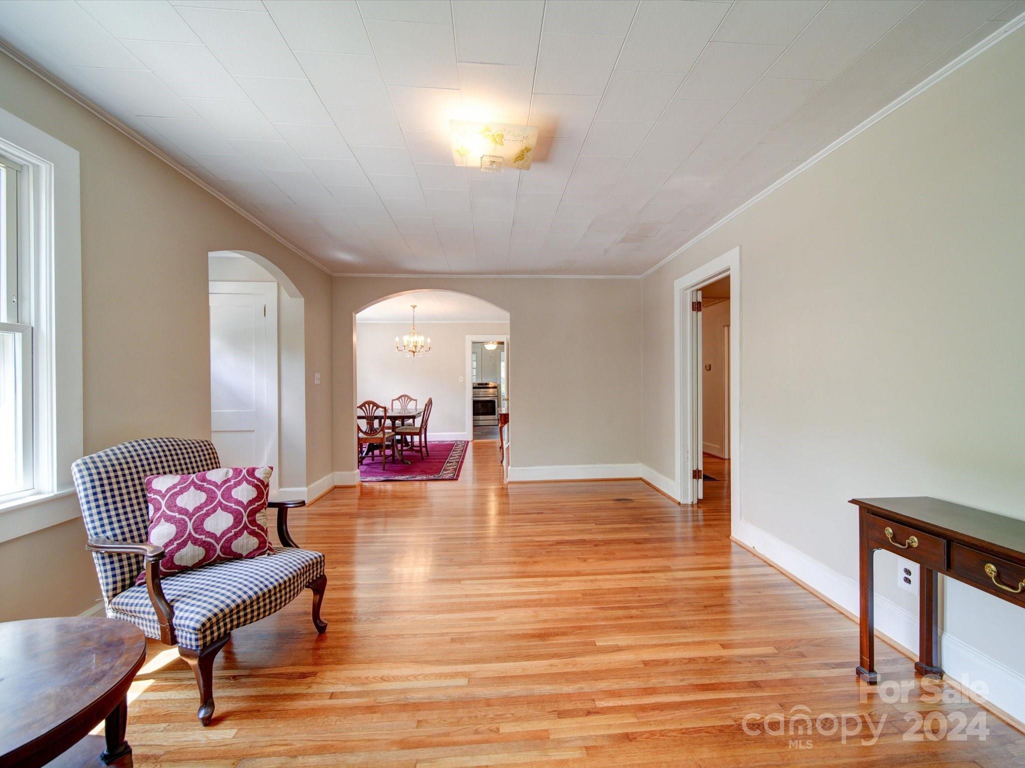 1102 White Store Road Wadesboro, NC 28170 - Photo 18 of 35 a view of a livingroom with furniture window and wooden floor