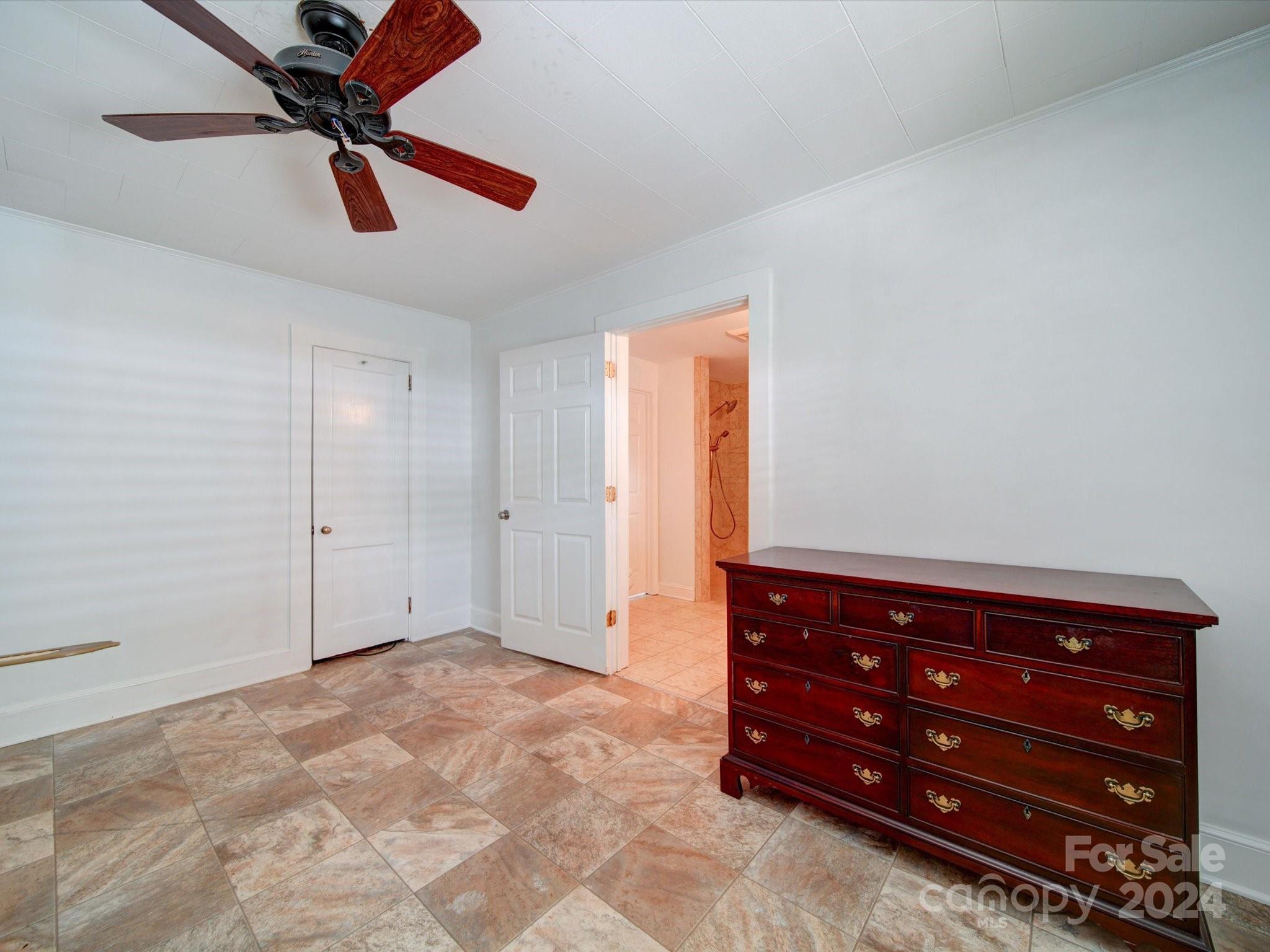 1102 White Store Road Wadesboro, NC 28170 - Photo 28 of 35 a view of room with closet and ceiling fan