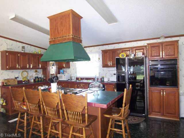 163 Summit Street Rural Hall, NC 27045 - Photo 3 of 9 Other. Check out the island in kitchen, great cabinets, and wall oven.