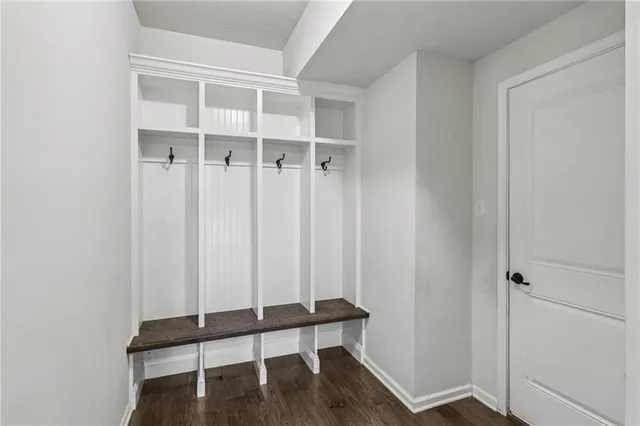 a room with table and mirror