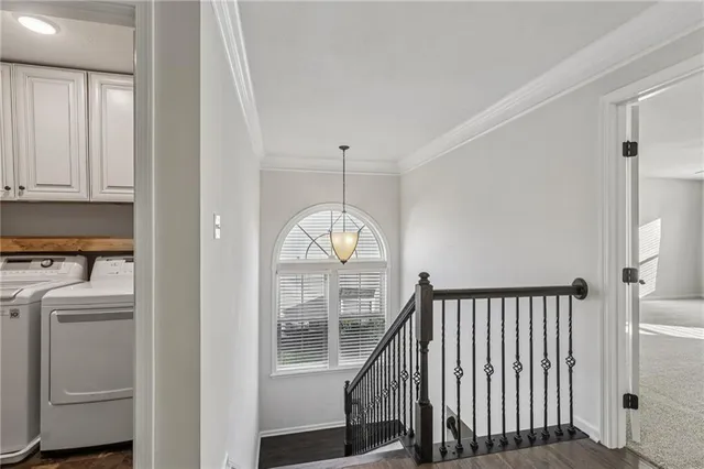 a view of a livingroom with furniture and a window