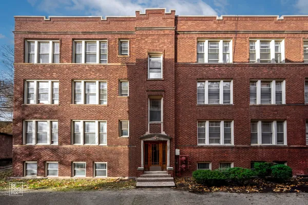a front view of a brick building