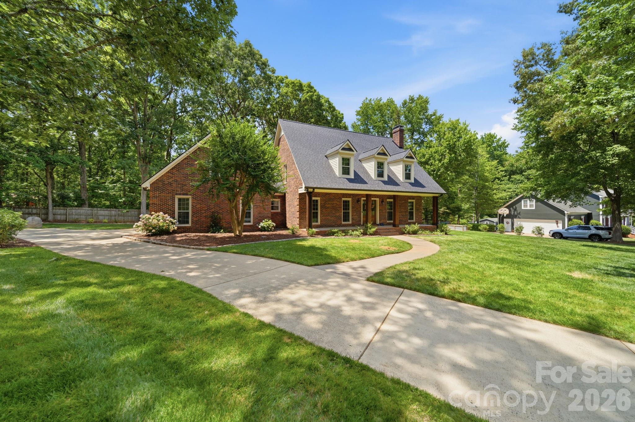 5243 Mintridge Road Mint Hill, NC 28227 - Photo 39 of 43 a house view with a garden space