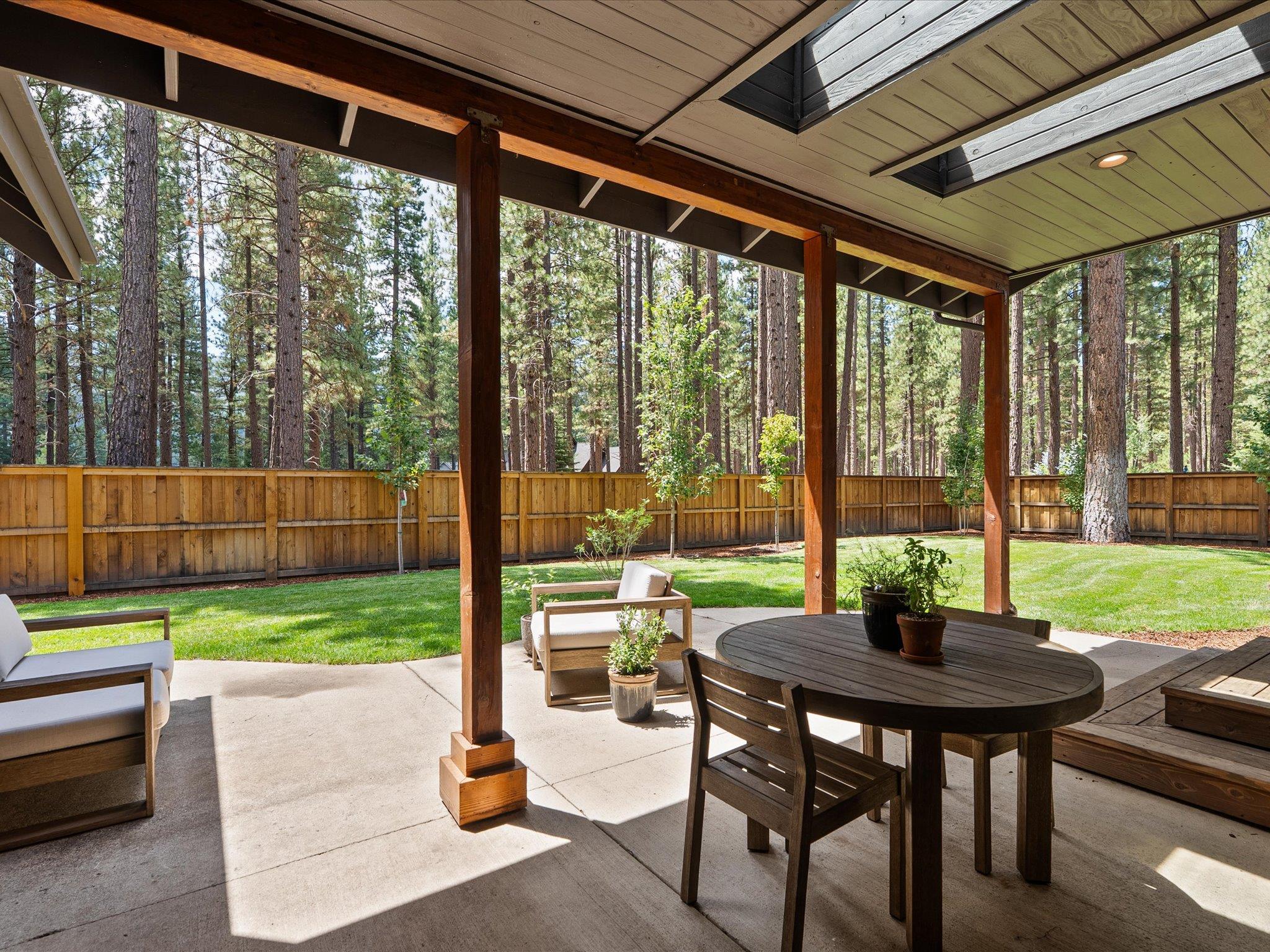 355 Quail View Circle Clio, CA 96106 - Photo 39 of 48 a view of a porch with chairs and backyard