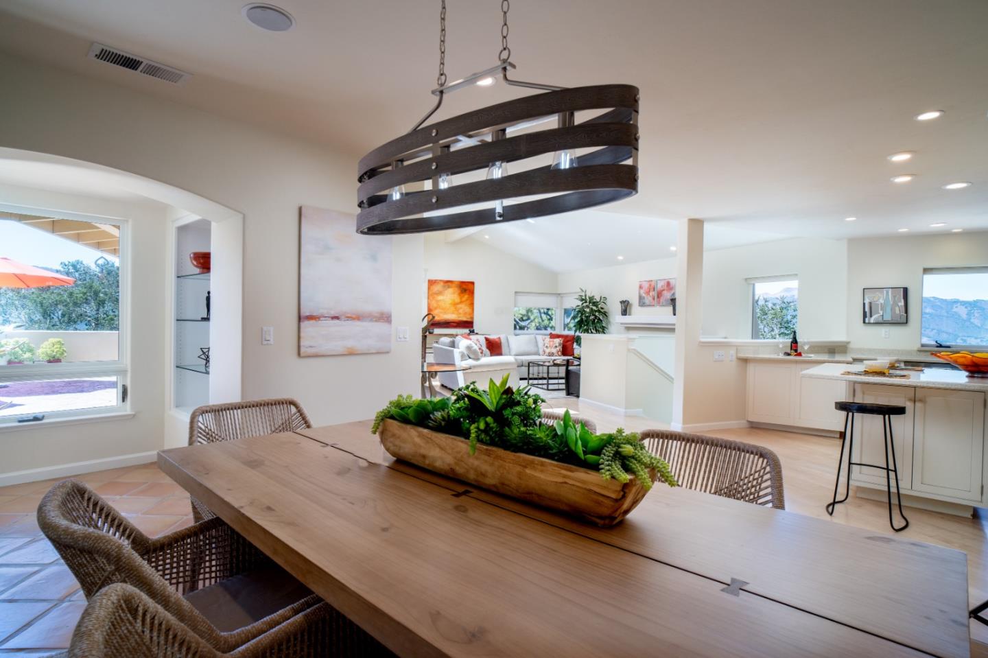 335 El Caminito Road Carmel Valley, CA 93924 - Photo 11 of 59 a kitchen with a table and chairs