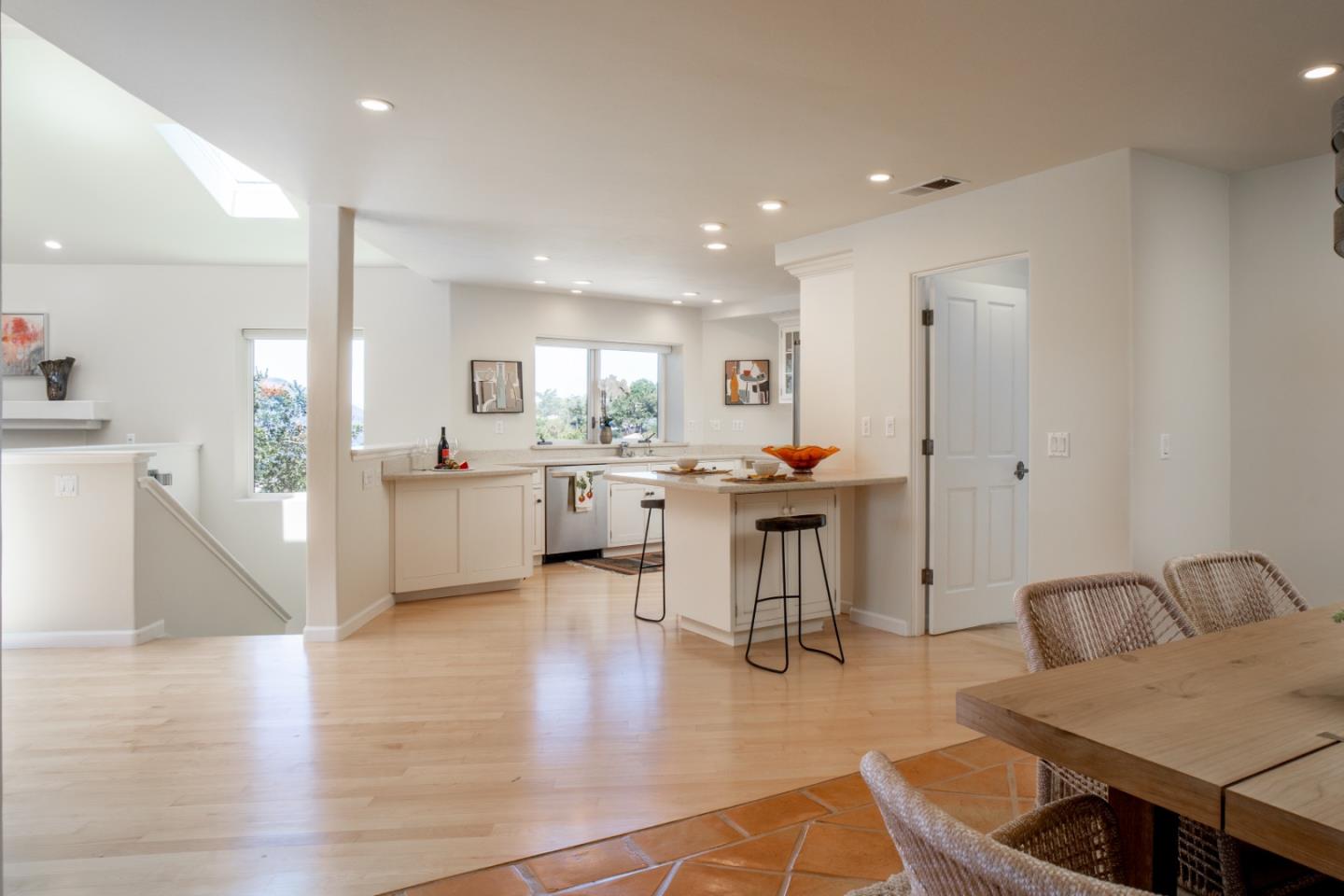 335 El Caminito Road Carmel Valley, CA 93924 - Photo 12 of 59 a open kitchen with white cabinets and stainless steel appliances